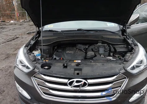 2014 Hyundai Santa Fe Sport 2.4L z USA, uszkodzony, nr VIN 5XYZUDLB1EG206574